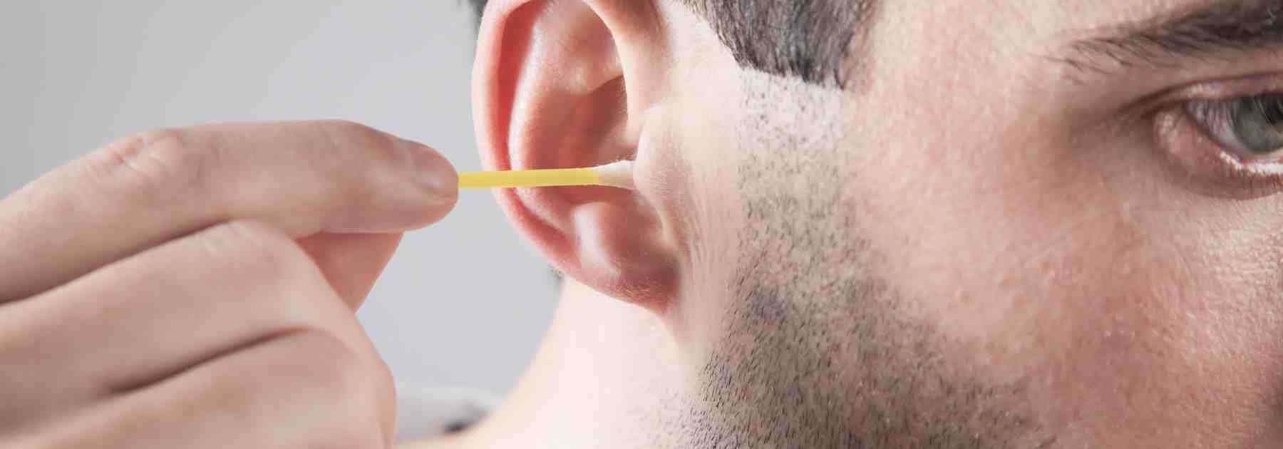 Buy an earwax removal kit. 